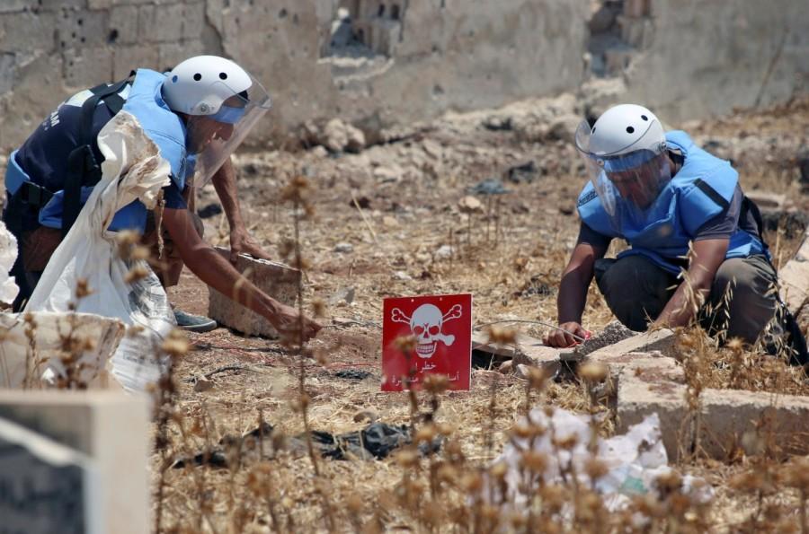 With relative calm in southwest Syria since a ceasefire was reached in early July, civil defense services in rebel-held Deraa have shifted focus to clearing unexploded cluster bombs left by air strikes. Syria,southwest Syria,cluster bombs,Syria cluster bombs