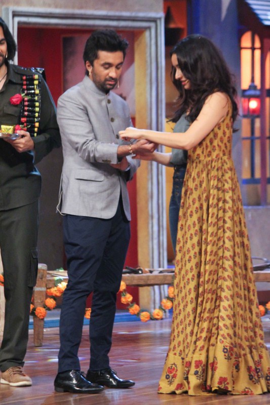 Bollywood actress Shraddha Kapoor ties rakhi to brother Siddhant on the sets of The Drama Company. Raksha Bandhan,Shraddha Kapoor ties rakhi to Siddhant,Siddhant Kapoor,Shraddha Kapoor,The Drama Company set,The Drama Company
