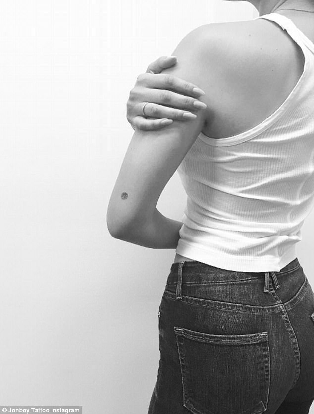 The 20-year-old got inked on Monday and shared a video on Instagram of herself lying face down getting the inking, and another of the finished product, which is located near to her elbow, reports dailymail.co.uk. Bella Hadid,Bella Hadid rose tattoo,Bella Hadid tattoo,JonBoy,artist JonBoy,bella hadid instagram,bella hadid sexy photo,bella hadid bikini