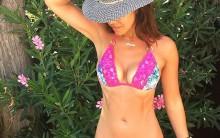 Model Myleene Klass flaunts her washboard abs in bikini.