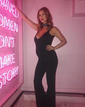 English television personality Ferne Alice McCann shows her growing baby bump.