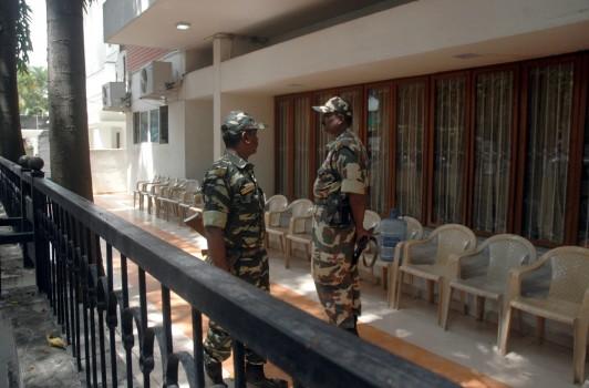 Income Tax (IT) sleuths on Wednesday began conducting raids at the official residence of Karnataka Power Minister D.K. Shivakumar and at a private resort near here where 44 Congress lawmakers from Gujarat are staying, said an official. 