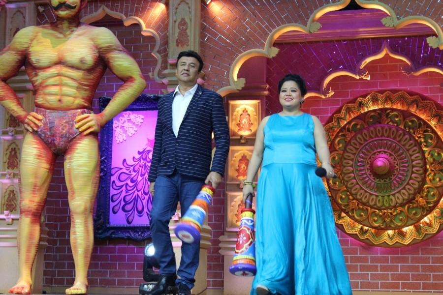 Music composer-singer Anu Malik and Indian stand-up comedian Bharti Singh during the launch of "Comedy Dangal" - a television show in Mumbai on Aug 3, 2017. Comedy Dangal show launch,Comedy Dangal,Comedy Dangal show launch pics,Anu Malik,Debina Bonnerjee,Bharti Singh