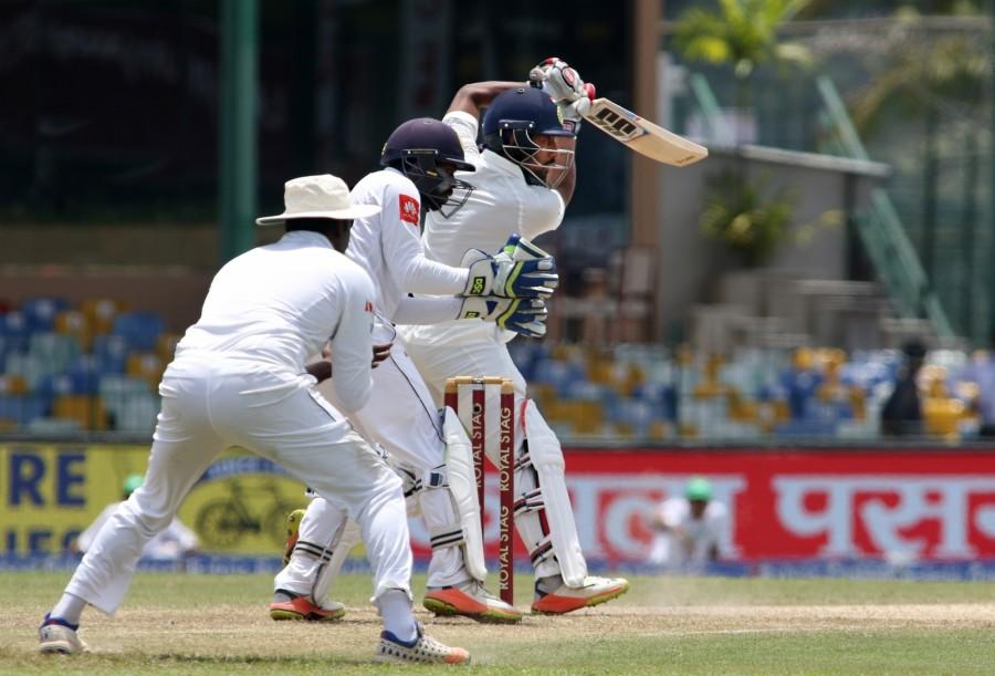 Rahane's dismissal brought a sigh of relief to the Sri Lankan camp, as wicketkeeper-batsman Saha and Ashwin safely guided India to 442/5 at the lunch break. Ravichandran Ashwin,Wriddhiman Saha,Sri Lanka,India vs Sri Lanka,india vs sri lanka live score,India vs Sri Lanka score,India vs Sri Lanka 2017