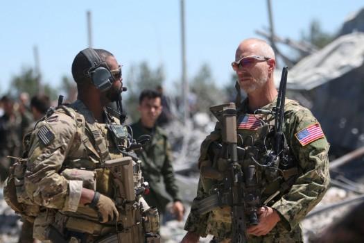 U.S. forces are seen at the Kurdish People's Protection Units (YPG) headquarters after it was hit by Turkish airstrikes in Mount Karachok near Malikiya, Syria, April 25, 2017.