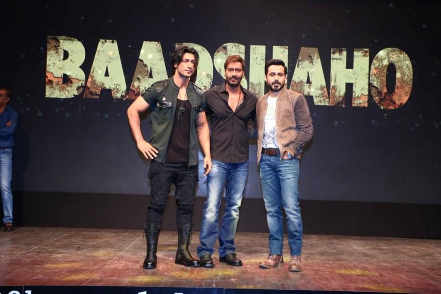 Actors Vidyut Jammwal, Ajay Devgan and Emraan Hashmi during the trailer launch of their upcoming film "Baadshaho" in Mumbai on Aug 7, 2017. Vidyut Jammwal,Ajay Devgan,Ileana D'Cruz,Emraan Hashmi,Esha Gupta,Baadshaho trailer,Baadshaho trailer launch,Baadshaho,Baadshaho trailer launch pics,Baadshaho trailer launch images,Baadshaho trailer launch stills,Baadshaho trailer launch pictures,Baa