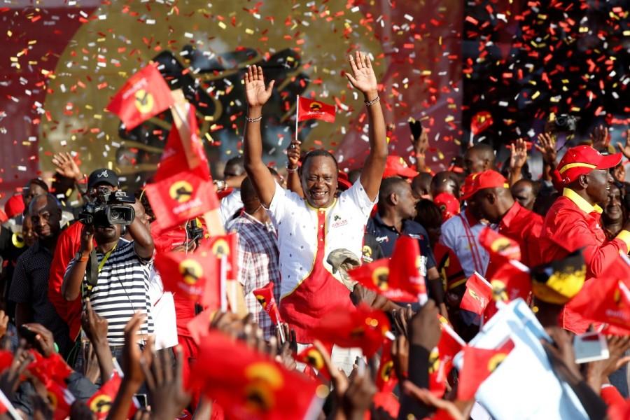 Kenya's President Uhuru Kenyatta waves to supporters during the last Jubilee Party campaign rally ahead of the August 8 election in Nakuru, Kenya August 5, 2017. Nervous Kenyans stockpiled food and water on Monday and police prepared emergency first aid kits as families headed to their ethnic heartlands on the eve of an election many fear could descend into violence. Kenya,Kenya election,Kenya gears up for election