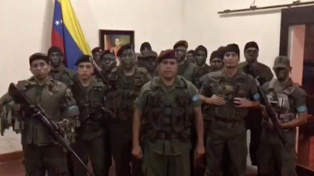 A still image from video released by Operation David Carabobo purportedly shows a group of men dressed in military uniforms announcing uprising in Valencia, Venezuela August 6, 2017.