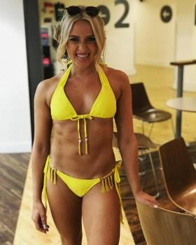Gabby Allen flaunts her ample cleavage in Bikini.