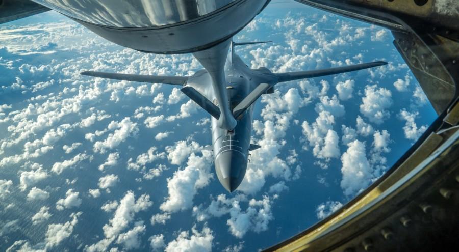 One of two U.S. Air Force B-1B Lancer bombers receives fuel from a KC-135 Stratotanker while flying a 10-hour mission from Andersen Air Force Base, Guam, into Japanese airspace and over the Korean Peninsula, July 30, 2017. Sabres rattle,North Korean,missile strike,President Trump