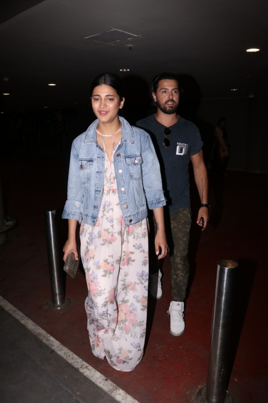 Actors Shruti Haasan and Michael Corsale spotted at Chhatrapati Shivaji Maharaj International airport in Mumbai. Shruti Haasan,actress Shruti Haasan,Shruti Haasan and Michael Corsale,Michael Corsale,Shruti Haasan rumoured boyfriend