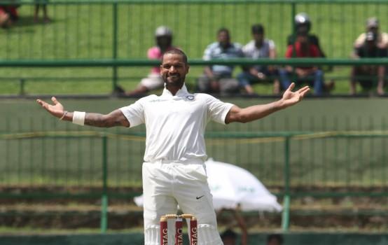 Sri Lanka hit back with three quick wickets even as Shikhar Dhawan's sixth Test ton helped India reach 235/3 at tea on the opening day of the third and final Test at the Pallekele International Cricket Stadium here on Saturday. Skipper Virat Kohli (11 not out) and Ajinkya Rahane (3 not out) went into the break undivided after left-arm spinner Malinda Pushpakumara packed off the opening duo of Shikhar Dhawan and Lokesh Rahul. Chinaman Lakshan Sandakan got the crucial wicket of one-down Cheteshwar Pujara just before the break.