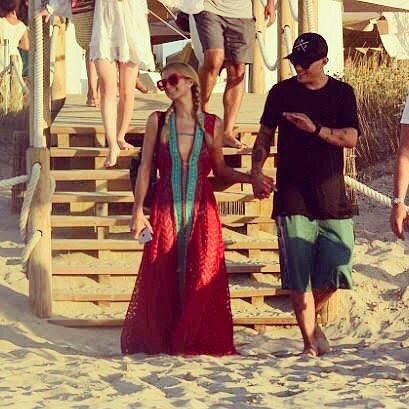 Zylka was seen wearing a green and white patterned pair of swimming trunks along with matching black-and-white baseball cap and black T-shirt. Paris Hilton,Paris Hilton and Chris Zylka,Chris Zylka,Paris Hilton enjoys boating,Paris Hilton boyfriend,Paris Hilton boyfriend Chris Zylka