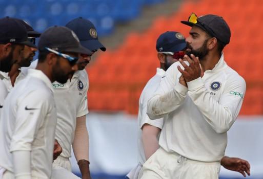 India inched towards victory even as Dinesh Chandimal and Angelo Mathews staged a desperate battle to prolong Sri Lanka's struggle with the hosts posting 82/4 in their second innings at lunch on the third day of the third cricket Test here on Monday.