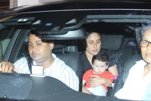 Taimur is happily sitting like a boss in mother Kareena Kapoor Khan’s lap.
