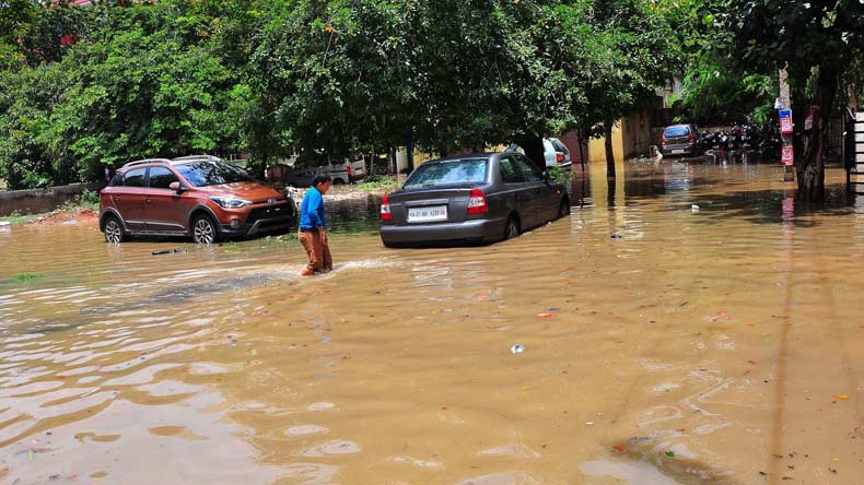 City Mayor G. Padmavathi said: "BBMP officials have been ordered to clean the drains and respond to public issues immediately." Along with Deputy Mayor M. Anand, Padmavathi visited affected areas during the day. The torrential rain uprooted trees, twisted electric poles and snapped cable lines in upscale residential areas, disrupting power supply. Bengaluru records heaviest rainfall,Bengaluru: Monday rain highest for August in 127 years,180mm rainfall,180mm rainfall in Bangalore