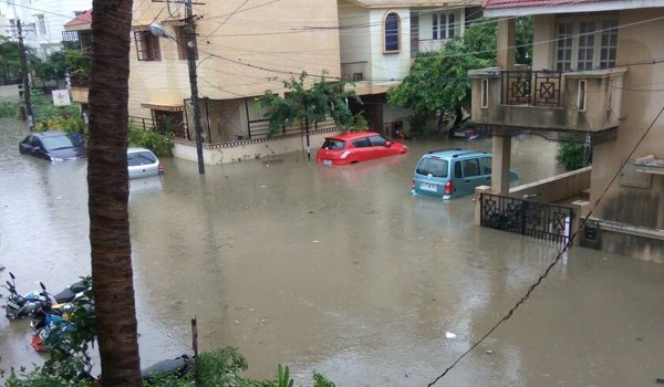 Civic officials used makeshift boats to rescue the stranded residents in some areas while power outages led to blackouts for hours since early morning in many areas. "We received distress calls and complaints from hundreds of affected regarding overflowing of drains, and rainwater entering basements, and ground floor houses and apartments," an official at the BBMP control room told IANS. Bengaluru records heaviest rainfall,Bengaluru: Monday rain highest for August in 127 years,180mm rainfall,180mm rainfall in Bangalore