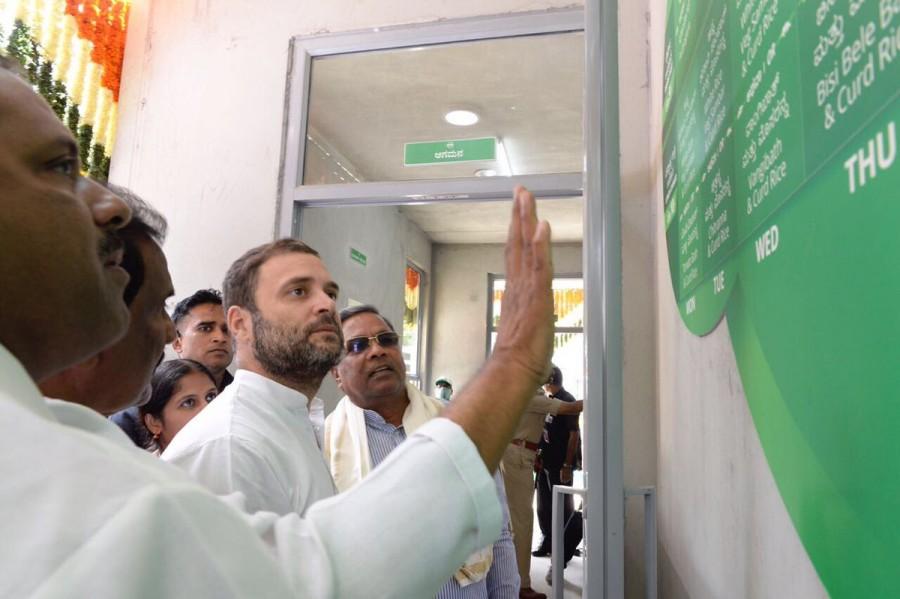 Along with Chief Minister Siddaramaiah, city Mayor G. Padmavathi, Karnataka Pradesh Congress Committee President G. Parameshwara and other party leaders, Gandhi inspected the canteen named after his grandmother and former Prime Minister Indira Gandhi. Besides the one in Jayanagar, 100 other canteens will be opened on Wednesday for dinner, which will be served free of cost to all on the first day, the Chief Minister said in a statement, calling the launch a "historic day" for Karnataka. Congress Vice President Rahul Gandhi,Rahul Gandhi,Indira Canteen,namma indira canteen,Rahul Gandhi launches Indira Canteen,Indira Canteen in Bengaluru