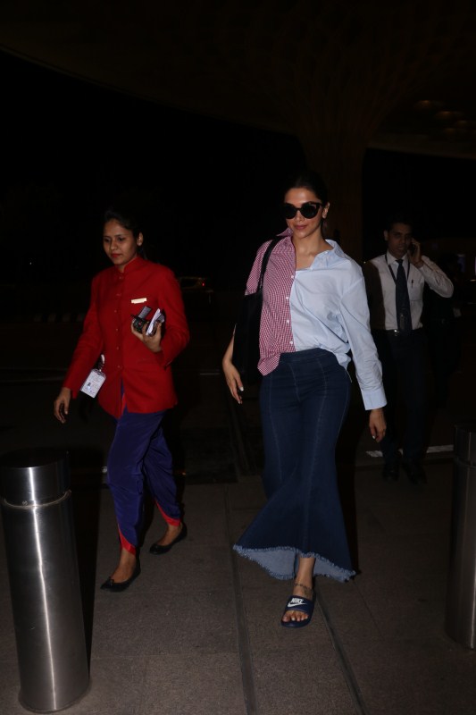 Deepika Padukone spotted at airport. Deepika Padukone spotted at airport,Sunny Leone spotted at airport,Deepika Padukone at airport,Sunny Leone at airport,Deepika Padukone,Sunny Leone