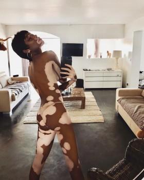 Winnie Harlow strips skimpy nude-coloured thong in sizzling snap.