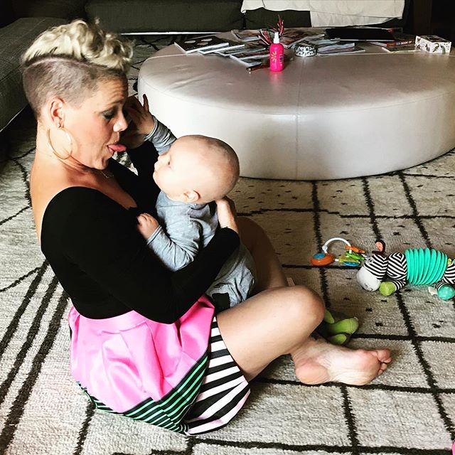 In another photograph, the mother of two spent quality time with her little one. The 37-year-old star sat cross-legged on the floor while holding the baby and teasing him with her tongue out. "Mamas multi-tasking," the Grammy winner said. Pink shares photo of her pumping breast milk,Pink breast milk,Pink pumping breast milk,Jameson