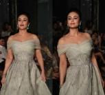 Bollywood actress Preity Zinta turned showstopper for designer duo Shane and Falguni Peacock in an off-shoulder floor-length smoky grey gown with exquisite emerald earrings that made her look like royalty.