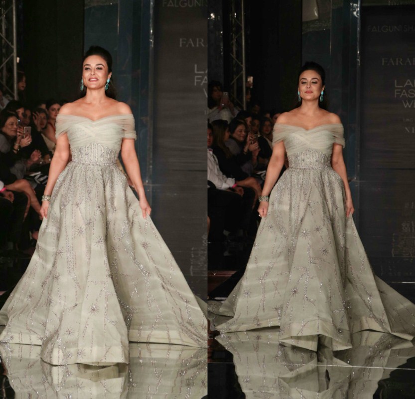 Supermodel Ujwala Raut opened the show in a figure-hugging embellished bodysuit stylised with a long cape and an organza jacket and looked every inch a glamorous diva. Preity Zinta,Preity Zinta dazzles at Lakme Fashion Week,Preity Zinta dazzles at Lakme Fashion Week 2017,Lakme Fashion Week 2017,Preity Zinta dazzles on the runway