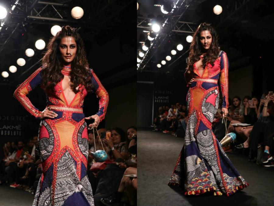 Marrying Madhubani art to modern sporty art, the silhouettes offered a characteristic style statement. The collection was a mix of sharp tailoring, mesmerisingly blended with conventional fits. Sheath dresses with predominant colourful Madhubani prints caused a sensation on the ramp. Showcasing diversity in their design aesthetics and overall versatility were a range of cropped tops, bell bottoms, tent dresses, palazzos, jumpsuits, skirts and shorts that were teamed with jackets that made the ensembles inventive yet commercial. Chitrangda Singh,Gorgeous Chitrangda Singh,Chitrangda Singh at Lakme Fashion Week 2017,Lakme Fashion Week 2017,Celebs at Lakme Fashion Week 2017,Neha Agarwal,Neha Agarwal at Lakme Fashion Week 2017