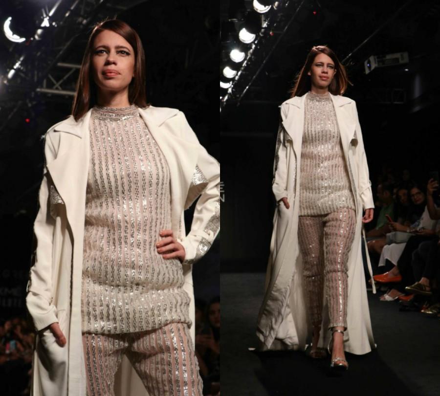 Kalki Koechlin looks like a vision in white as she closes the show for Nikitam Haisalkar at Lakme Fashion Week. Kalki Koechlin,actress Kalki Koechlin,Kalki Koechlin at LFW 2017,Kalki Koechlin at Lakme Fashion Week,Lakme Fashion Week,Lakme Fashion Week 2017,Celebs at Lakme Fashion Week