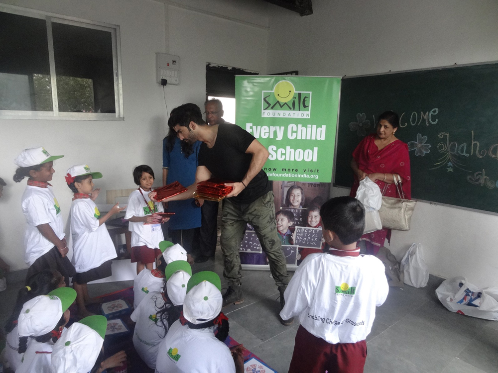 Actor Taaha Shah, who will soon be seen as the lead in Anupam Kher's "Ranchi Diaries", spent some quality time with children at NGO Smile Foundation's centre in Dharavi here. He spoke about the importance of education and overall personality development. Taaha also taught them a few dance steps and emphasised on the need for self-defence when he met the children on Friday. "We had an absolute blast as I love kids and gel along very well with them. It was a fun afternoon and I showed them some dance moves and played a guitar as well. Taaha Shah,actor Taaha Shah,Anupam Kher,Ranchi Diaries,NGO Smile Foundation