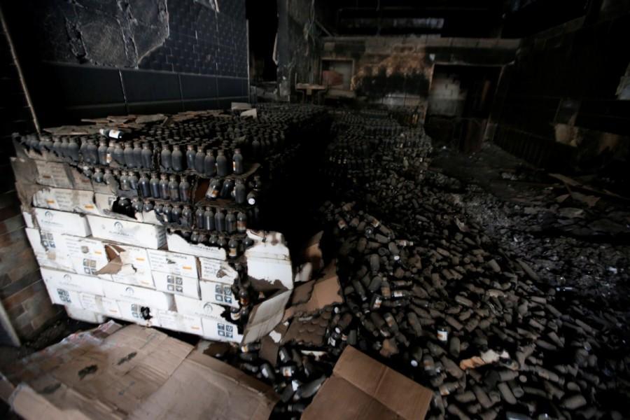Burnt medicine is seen in a maternity hospital damaged from the war against Islamic State militants in east Mosul. Islamic State turned the hospital into a warehouse to store medical supplies – mainly glucose injections and cough syrup. As their defeat looked imminent, they started fires and detonated explosives throughout the hospital. Mosul's maternity hospital,Al-Khansa Hospital,East Mosul
