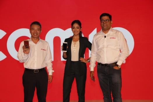 Comio CEO Sanjay Kalirona along with actress Yami Gautam at the launch of Comio smartphone in New Delhi, on August 18, 2017.