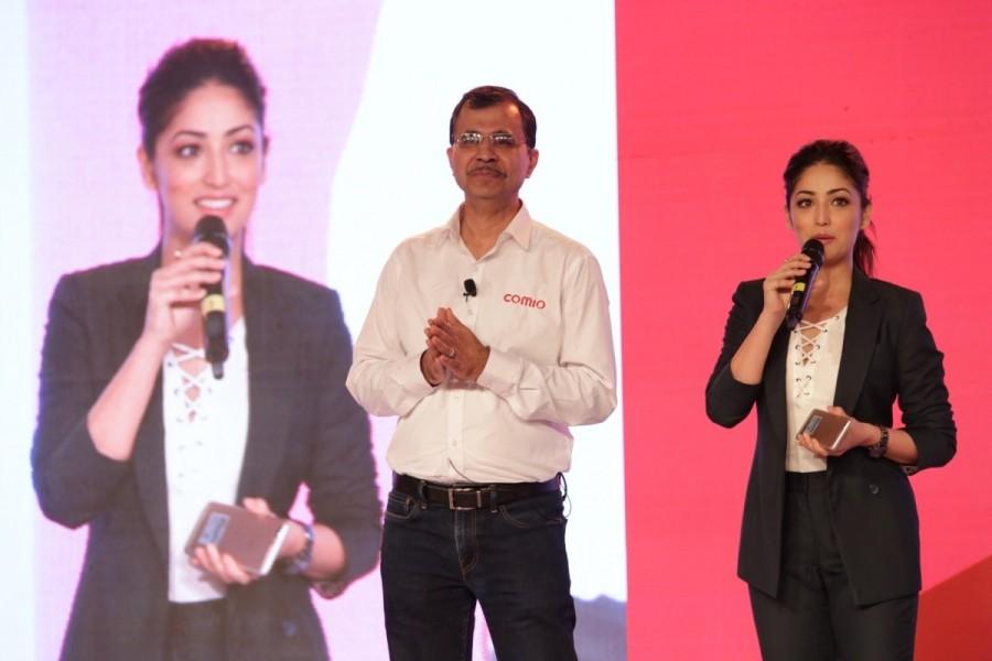 Comio CEO Sanjay Kalirona along with actress Yami Gautam at the launch of Comio smartphone in New Delhi. Yami Gautam,actress Yami Gautam,Comio smartphones,Comio smartphones launch