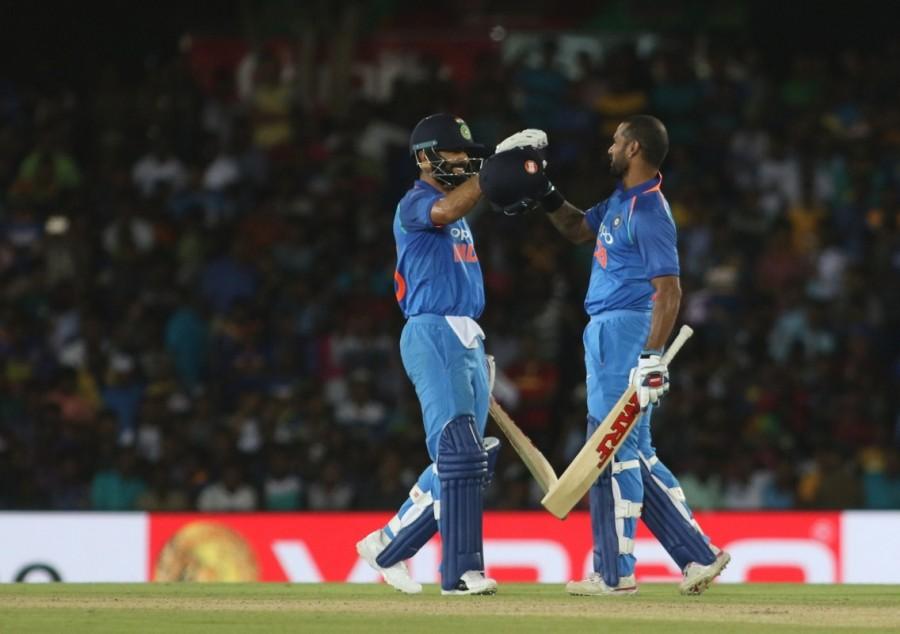 Dhawan slammed 132 runs in 90 balls while Kohli smashed 82 runs off 70 deliveries. Both players forged a 197-run partnership for the second wicket, the highest in Sri Lanka against Sri Lanka. It all went good for India in this match. After a little bit of punishment initially, their bowlers bounced back in style to restrict the hosts for 216 and then Dhawan and Kohli applied themselves perfectly to chase down the total with 21.1 overs (127 balls) remaining. This also helped them to record their biggest win, in terms of overs to spare, for a target of over 200. Coming in to chase a relatively low total, openers Rohit Sharma and Dhawan started the innings on a steady note but Rohit failed to support the Delhi batsman for long as he was dismissed in the fifth over with barely 23 runs on the board. Shikhar Dhawan,Virat Kohli,India rout Sri Lanka by 9 wickets,India rout Sri Lanka,skipper Virat Kohli,India beats Sri Lanka,India vs Sri Lanka