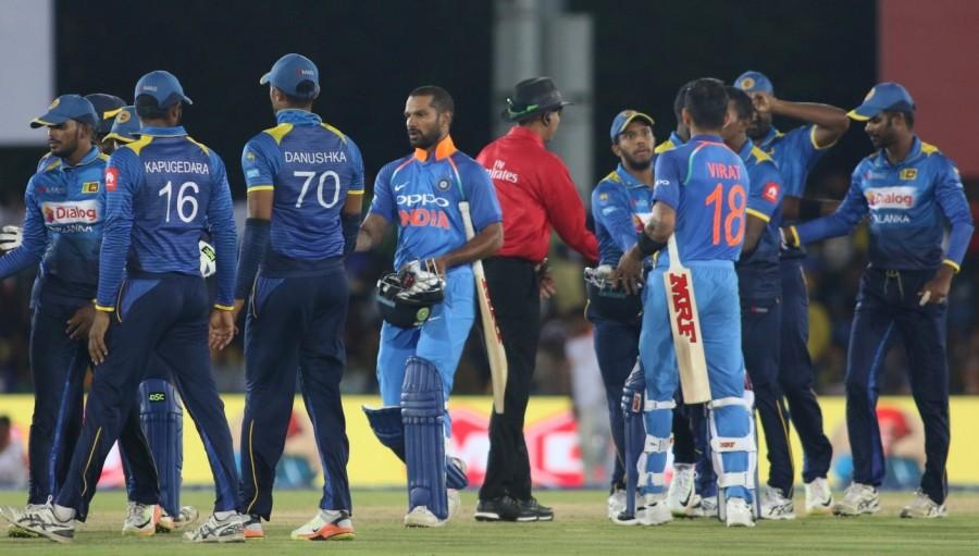 Lower-order players Thisara Perera (0), Lakshan Sandakan (5) and Lasith Malinga (8) tried to make up for the middle-order collapse but failed and thus, after a perfect start, the Islanders were restricted to 216. For India, left-arm spinner Axar Patel scalped three wickets while Bumrah, Chahal and Jadhav took two wickets each. Shikhar Dhawan,Virat Kohli,India rout Sri Lanka by 9 wickets,India rout Sri Lanka,skipper Virat Kohli,India beats Sri Lanka,India vs Sri Lanka