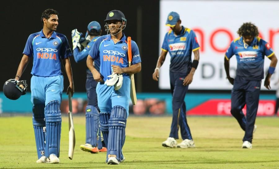 Chasing a revised target of 231 due to rain, India were cruising at 108 for no loss in the 16th over. But the match turned on its head in a space of six overs as the visitors lost seven wickets for just 22 runs. All-rounder Akila Dananjaya created havoc in the India's batting line-up as he scalped six wickets in his 10 overs. But then Dhoni (45 not out) and Bhuvneshwar A(53 not out) forged a match-winning partnership to seal the deal for India. India now lead the five match series 2-0. The visitors had defeated Sri Lanka by nine wickets in the ODI at Dambulla. Mahendra Singh Dhoni,Bhuvneshwar Kumar,India,India vs Sri Lanka,India vs Sri Lanka 2017,India vs Sri Lanka cricket match