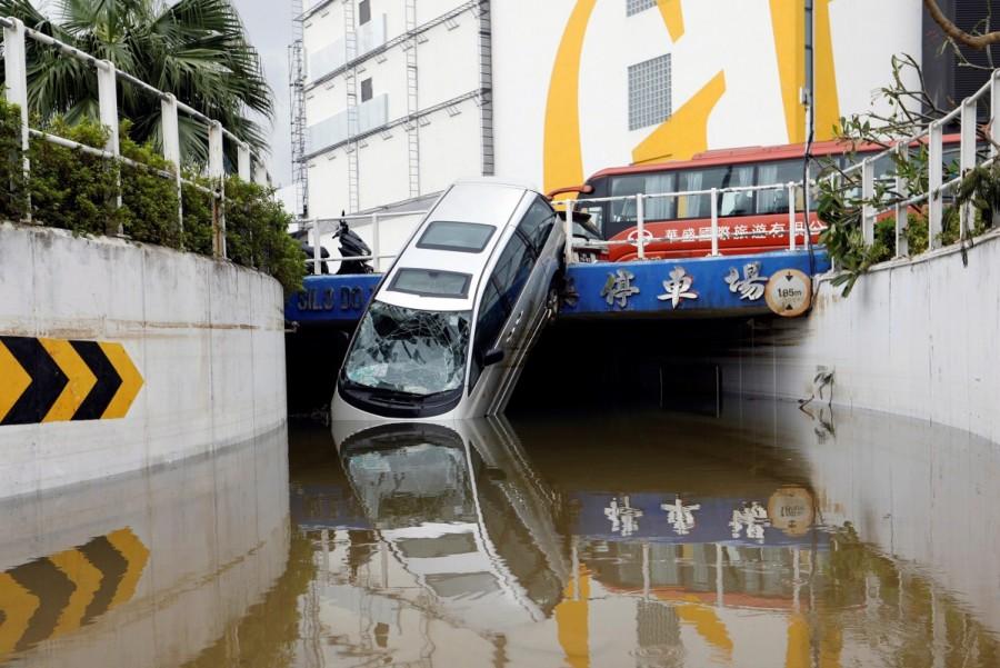 A vehicle damaged by Typhoon Hato is seen in Macau. Typhoon Hato,Hong Kong,typhoon,Macau,Hong Kong and Macau