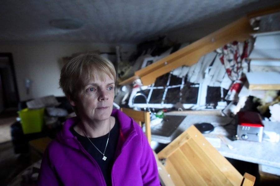 Bernie Kearney, a medical receptionist who lives in the northern county of Donegal, was dining alone in her kitchen on Tuesday evening when a landslide hit the hill beside her house. Bernie Kearney,Irish woman escapes landslide,landslide