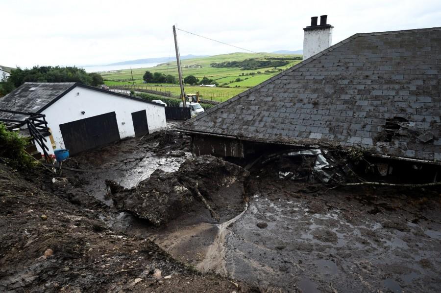 Bernie Kearney's home is seen. Kearney escaped by climbing out a window. She was not injured. Bernie Kearney,Irish woman escapes landslide,landslide