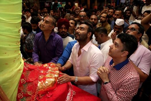 Bollywood actor Ajay Devgn seeks blessings of Lalbaugcha Raja on Ganesh Chaturthi.