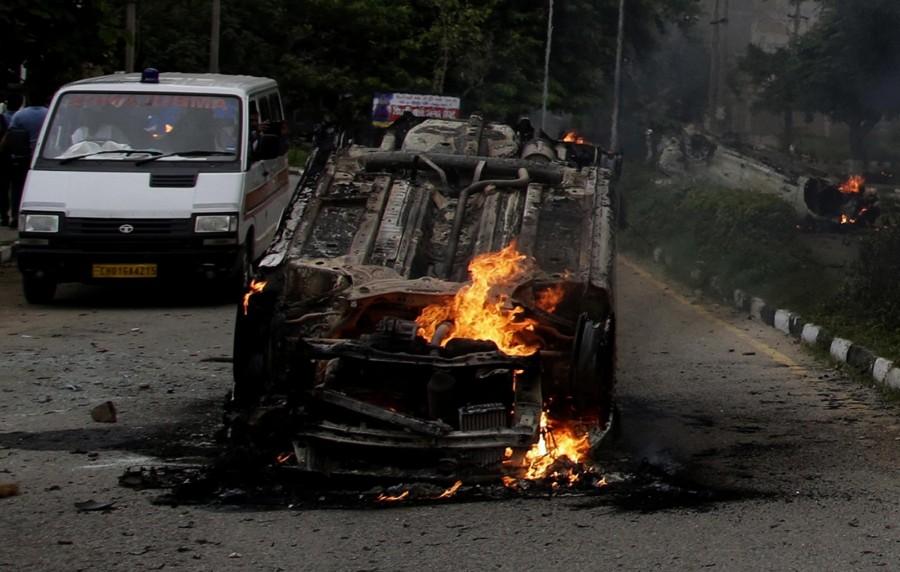 At least 30 people were killed on Friday as security forces fired at rampaging mobs in Panchkula town in Haryana after a court held self-styled godman Gurmeet Ram Rahim Singh guilty of rape and sexual exploitation. The violence also gripped parts of Haryana and Punjab, leaving more than 250 people injured. Curfew was imposed in towns in 10 Punjab districts, including Mansa, Bathinda, Patiala, Fazilka, Ferozepore, Faridkot, Malout, Sangrur and Barnala following the violence. Haryana's Panchkula, adjoining Chandigarh, where a CBI court gave a guilty ruling against the Dera chief, resembled a war zone. Besides Panchkula, curfew was imposed in Sirsa, headquarters of Dera Sacha Sauda where one person died in the violence, and Kaithal towns. Gurmeet Ram Rahim Singh verdict,Gurmeet Ram Rahim Singh,Panchkula town,godman Gurmeet Ram Rahim Singh,250 people injured,Haryana and Punjab