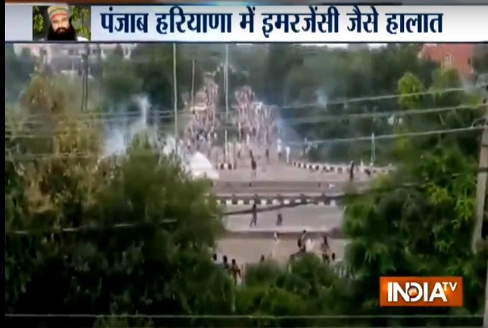 In Sangrur, a tehsil office in Lehragaga town went up in flames. In Lambi town in Punjab's Muktsar district, masked men lobbed petrol bombs on a telephone exchange and fired into the air to trigger panic. Across Haryana, traders lowered the shutters of shops in most towns. Security of Rohtak town was handed over to the Central Reserve Police Force. The town was also at the centre of widespread Jat agitation violence in February last year. Punjab Chief Minister Amarinder Singh and Haryana Chief Minister Manohar Lal Khattar appealed to the people to maintain calm. In Delhi, where two empty train coaches and two buses were set on fire, Chief Minister Arvind Kejriwal made a similar appeal. Gurmeet Ram Rahim Singh verdict,Gurmeet Ram Rahim Singh,Panchkula town,godman Gurmeet Ram Rahim Singh,250 people injured,Haryana and Punjab