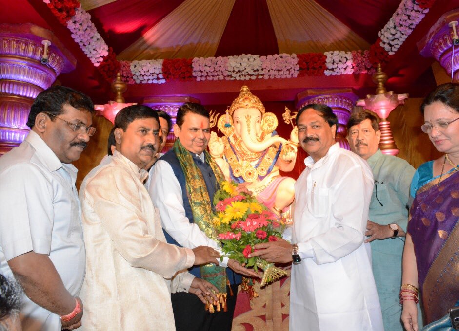 The political temperatures shot up suddenly on Saturday as Maharashtra Chief Minister Devendra Fadnavis made a surprise visit to the home of senior Congress leader and former Chief Minister Narayan T. Rane late on Friday night. Since the past few months, there has been widespread speculation that Rane is likely to desert Congress and join the ruling Bharatiya Janata Party. Maharashtra CM Devendra Fadnavis,Devendra Fadnavis,Narayan T. Rane,former Chief Minister Narayan T. Rane,Ganpati,Ganpati celebration