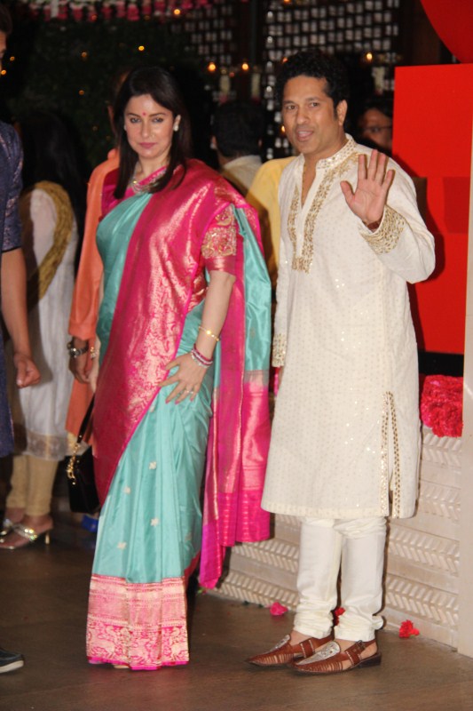 Sachin Tendulkar with his wife at Mukesh Ambani's bash. Sachin Tendulkar,Ganesh Chaturathi Celebrations,Harbhajan Singh,Sachin Tendulkar Mukesh Ambani bash,Harbhajan Singh at Mukesh Ambani bash,Mukesh Ambani bash