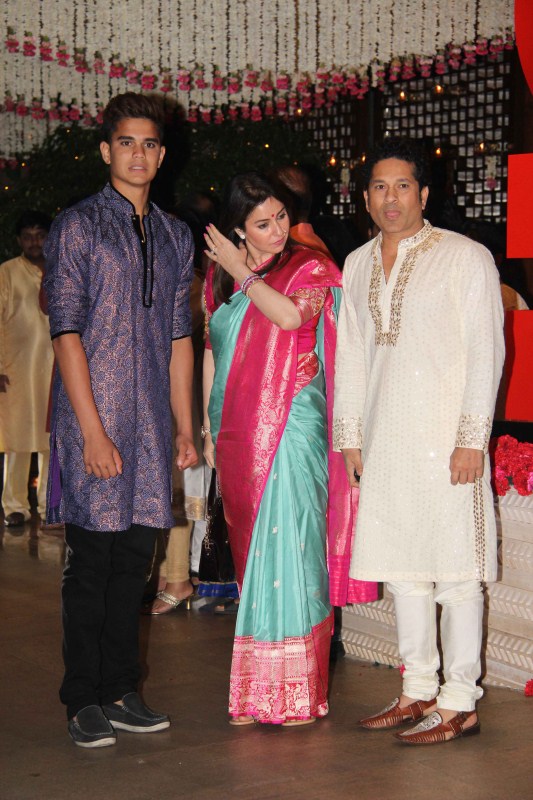 Former Indian cricketer Sachin Tendulkar arrived for Ganesh Chaturthi celebrations with his wife and son. Sachin Tendulkar,Ganesh Chaturathi Celebrations,Harbhajan Singh,Sachin Tendulkar Mukesh Ambani bash,Harbhajan Singh at Mukesh Ambani bash,Mukesh Ambani bash