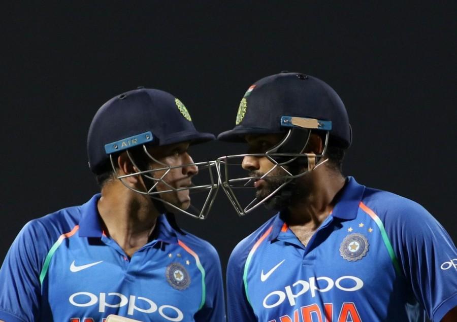 Opener Rohit Sharma's briliant unbeaten ton helped India beat Sri Lanka by six wickets to seal the five match One-Day International series 3-0 here on Sunday. Apart from Rohit (124 not out), former skipper Mahendra Singh Dhoni (67 not out) played a perfect support role at the other end after India's top order got exposed with the scoreboard reading 61/4 in 15.1 overs. The duo forged an unbeaten 157-run partnership for the fifth wicket but just when eight runs were needed, the crowd hurled bottles in the ground and the match had to be stopped. After a long wait, the umpires decided to call off the match. But, after the players left the field after the customary handshakes, security persons got the stadium emptied of spectators and the umpires then decided to resume the match. India vs Sri Lanka 2017,India vs Sri Lanka,Rohit Sharma,MS Dhoni,India beat Sri Lanka by 6 wickets,India beat Sri Lanka