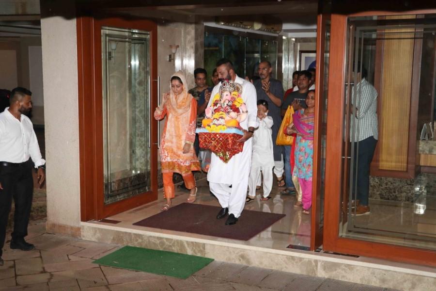 Bollywood actor Sanjay Dutt, who along with his family members and the team of his upcoming film "Bhoomi" on Friday got together to welcome Ganpati on the occasion of Ganesh Chaturthi, says the God has always blessed him. Sanjay, who has had a tumultous personal life, was at the T-Series studio performing aarti and prayers along with his wife Maanayata, who was dressed in traditional wear. Also present were director Omung Kumar, producer Bhushan Kumar and actors Sharad Kelkar and Aditi Rao Hydari among others. Ganesh Visarjan,Sanjay Dutt,Sanjay Dutt and family bid adieu,Lord Ganesha,Sanjay Dutt bid adieu to Lord Ganesha,Sanjay Dutt Ganesh Visarjan
