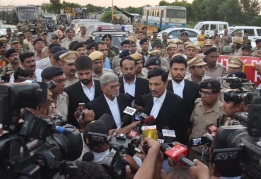 Dera Sacha Sauda chief Gurmeet Ram Rahim Singh's lawyer SK Garg Narwana talks to press after Self-styled spiritual guru Gurmeet Ram Rahim Singh sentenced to 20 years in prison for the rape of two women followers in 2002; in Rohtak.