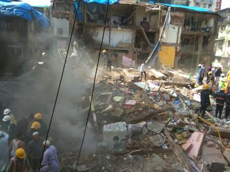 A four-storeyed residential building collapsed near J.J. Hospital in south Mumbai on Thursday, officials said.