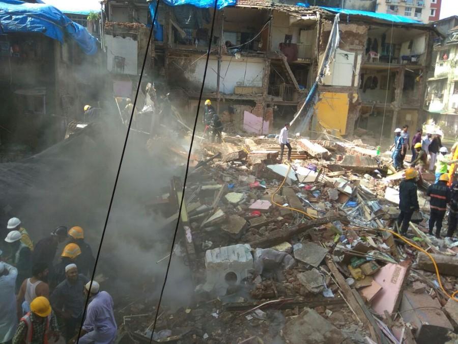 A four-storeyed residential building collapsed near J.J. Hospital in south Mumbai on Thursday, officials said. Building collapse,Mumbai building collapse,Building collapse in Mumbai,J.J. Hospital